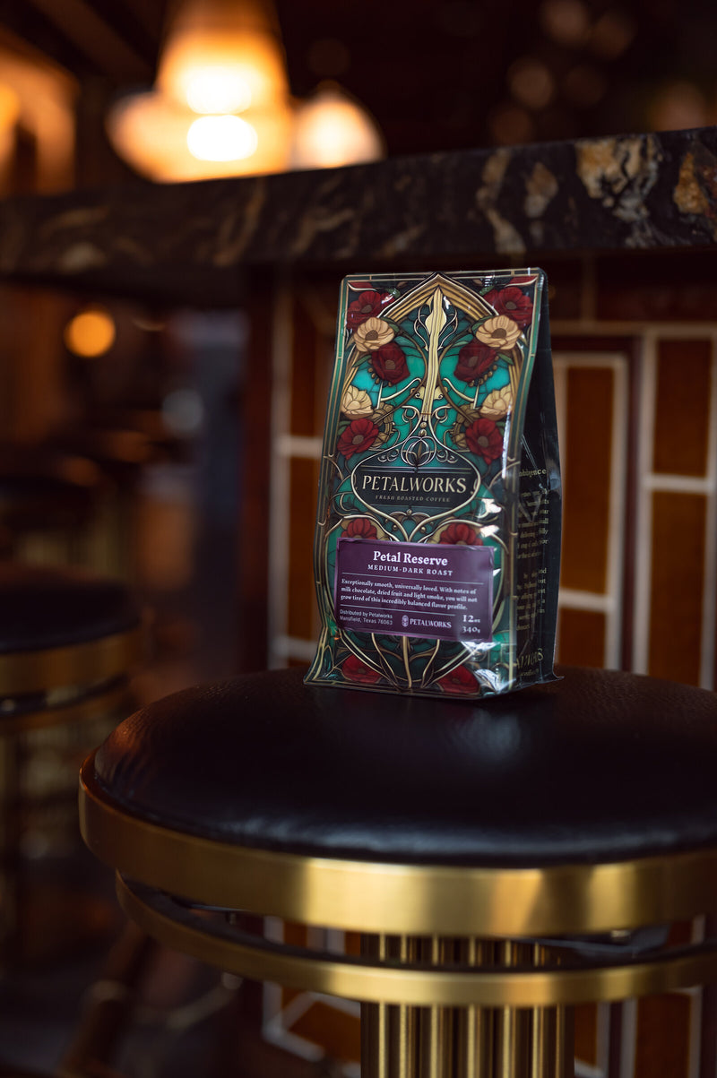 Petal Reserve coffee bag on a brass bar stool